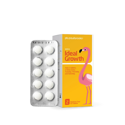 Packaging of Ideal Growth tablets with a pink flamingo design on a white background